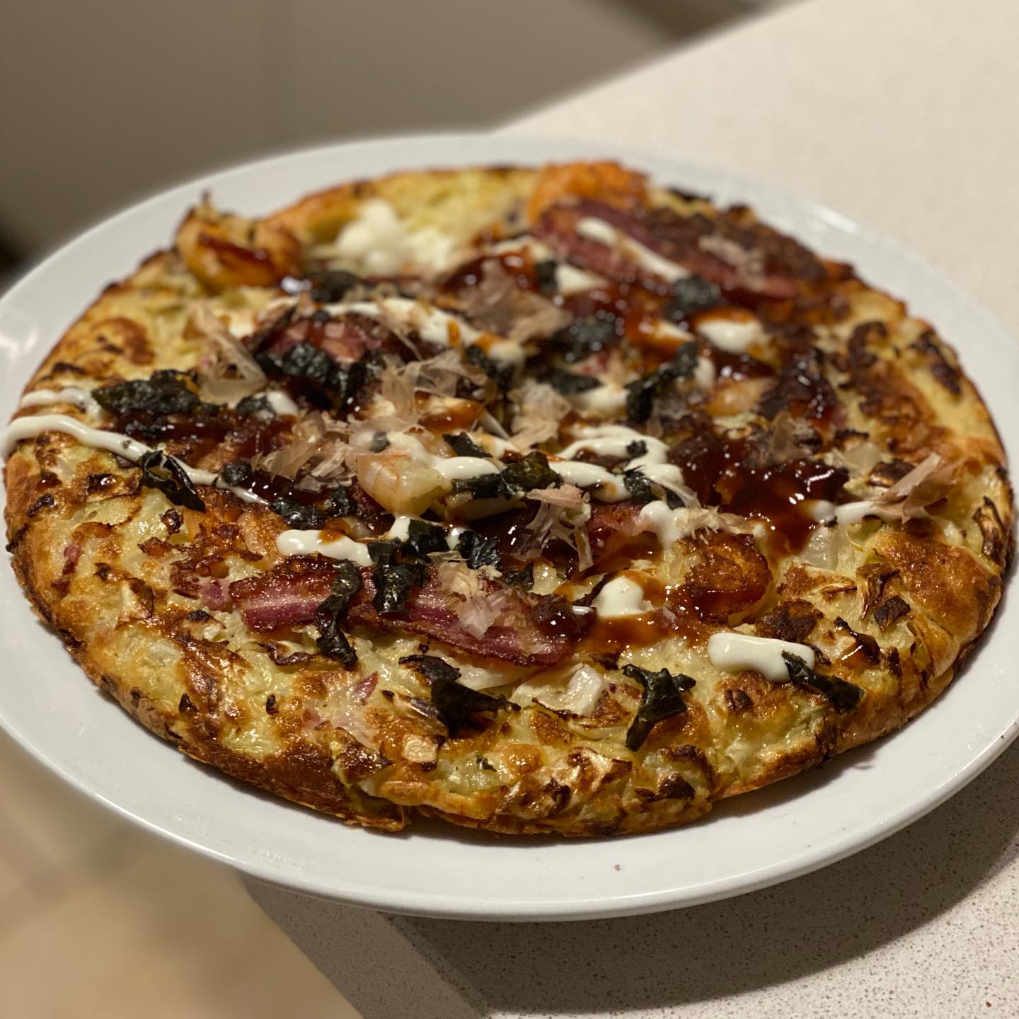 Where East meets West (Cork) - Japanese Okonomiyaki with smoked bacon from  in West Cork.